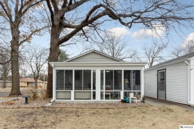 Welcome to this charming 3 bedroom, 3 stall garage home on Jim Ager Memorial Junior Golf Course in Nebraska - for sale on GolfHomes.com, golf home, golf lot