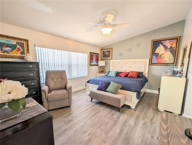 Enjoy this Beautiful two-story pool home, in the private and on The Grand Club - Pine Lakes Course in Florida - for sale on GolfHomes.com, golf home, golf lot