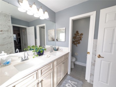 Enjoy this Beautiful two-story pool home, in the private and on The Grand Club - Pine Lakes Course in Florida - for sale on GolfHomes.com, golf home, golf lot