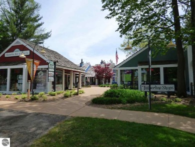 Beautiful, and lightly treed, lot overlooks the 4th fairway at on Shanty Creek Golf Course in Michigan - for sale on GolfHomes.com, golf home, golf lot