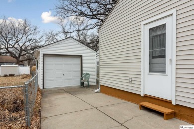 Welcome to this charming 3 bedroom, 3 stall garage home on Jim Ager Memorial Junior Golf Course in Nebraska - for sale on GolfHomes.com, golf home, golf lot