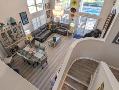 Enjoy this Beautiful two-story pool home, in the private and on The Grand Club - Pine Lakes Course in Florida - for sale on GolfHomes.com, golf home, golf lot