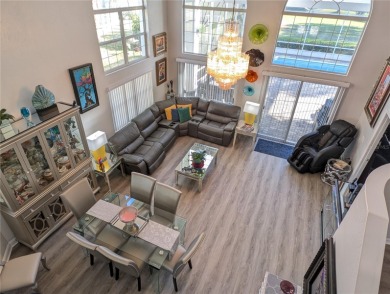 Enjoy this Beautiful two-story pool home, in the private and on The Grand Club - Pine Lakes Course in Florida - for sale on GolfHomes.com, golf home, golf lot