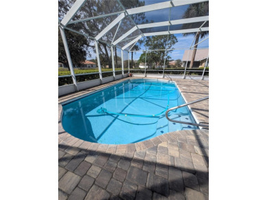 Enjoy this Beautiful two-story pool home, in the private and on The Grand Club - Pine Lakes Course in Florida - for sale on GolfHomes.com, golf home, golf lot