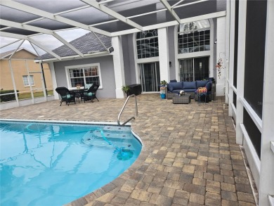 Enjoy this Beautiful two-story pool home, in the private and on The Grand Club - Pine Lakes Course in Florida - for sale on GolfHomes.com, golf home, golf lot