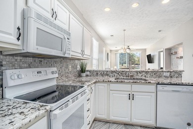 Welcome home to this beautifully updated 2 bedroom, 2 bath first on River Oaks Golf Plantation  in South Carolina - for sale on GolfHomes.com, golf home, golf lot