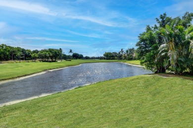 Renovated home with 5 bedrooms + office and amazing lake & golf on St. Andrews Country Club of Boca Raton in Florida - for sale on GolfHomes.com, golf home, golf lot