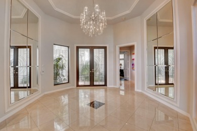 Renovated home with 5 bedrooms + office and amazing lake & golf on St. Andrews Country Club of Boca Raton in Florida - for sale on GolfHomes.com, golf home, golf lot