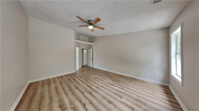 This renovated 3 bedroom, 2 bathroom home offers modern living on Mystery Valley Golf Course in Georgia - for sale on GolfHomes.com, golf home, golf lot