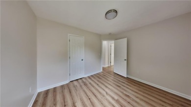 This renovated 3 bedroom, 2 bathroom home offers modern living on Mystery Valley Golf Course in Georgia - for sale on GolfHomes.com, golf home, golf lot