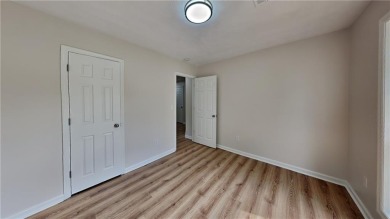 This renovated 3 bedroom, 2 bathroom home offers modern living on Mystery Valley Golf Course in Georgia - for sale on GolfHomes.com, golf home, golf lot