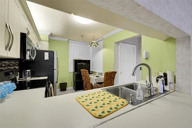 55+ COMMUNITY  IN THE SOUGHT AFTER SUNRISE LAKES PHASE IV, 2/2 on Sunrise Lakes Phase IV Golf Course in Florida - for sale on GolfHomes.com, golf home, golf lot