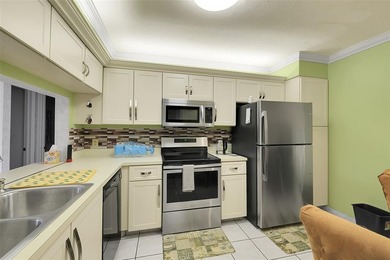 55+ COMMUNITY  IN THE SOUGHT AFTER SUNRISE LAKES PHASE IV, 2/2 on Sunrise Lakes Phase IV Golf Course in Florida - for sale on GolfHomes.com, golf home, golf lot