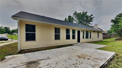 This renovated 3 bedroom, 2 bathroom home offers modern living on Mystery Valley Golf Course in Georgia - for sale on GolfHomes.com, golf home, golf lot