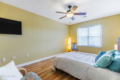Top-floor, end-unit condo in the desirable Woodlands at Crow on Crow Creek Golf Club in North Carolina - for sale on GolfHomes.com, golf home, golf lot