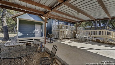 Nestled in a serene setting, this classic rustic home in the on Canyon Lake Golf Club in Texas - for sale on GolfHomes.com, golf home, golf lot