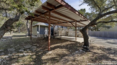 Nestled in a serene setting, this classic rustic home in the on Canyon Lake Golf Club in Texas - for sale on GolfHomes.com, golf home, golf lot