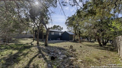 Nestled in a serene setting, this classic rustic home in the on Canyon Lake Golf Club in Texas - for sale on GolfHomes.com, golf home, golf lot