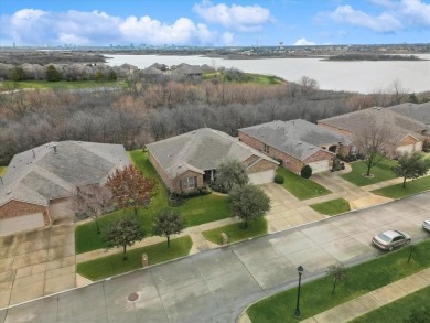 Beautiful Magnolia Model with a gorgeous Seasonal Water View on Frisco Lakes Golf Course in Texas - for sale on GolfHomes.com, golf home, golf lot