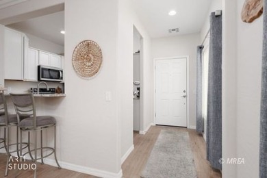 Beautiful 2-bedroom, 2-bath home with a versatile den that's on Conestoga Golf Club in Nevada - for sale on GolfHomes.com, golf home, golf lot