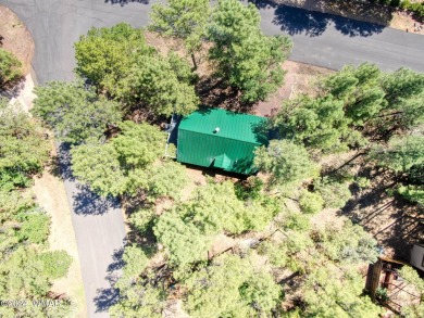 Your Lil' Cabin in the Woods!
Nestled on a heavily treed 1/4 on Bison Golf and Country Club in Arizona - for sale on GolfHomes.com, golf home, golf lot
