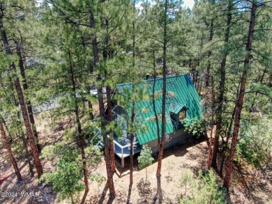 Your Lil' Cabin in the Woods!
Nestled on a heavily treed 1/4 on Bison Golf and Country Club in Arizona - for sale on GolfHomes.com, golf home, golf lot