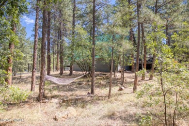Your Lil' Cabin in the Woods!
Nestled on a heavily treed 1/4 on Bison Golf and Country Club in Arizona - for sale on GolfHomes.com, golf home, golf lot