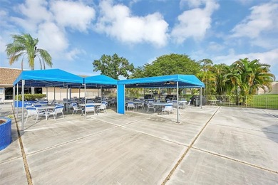 55+ COMMUNITY  IN THE SOUGHT AFTER SUNRISE LAKES PHASE IV, 2/2 on Sunrise Lakes Phase IV Golf Course in Florida - for sale on GolfHomes.com, golf home, golf lot