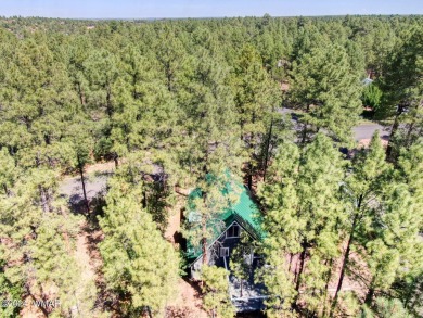 Your Lil' Cabin in the Woods!
Nestled on a heavily treed 1/4 on Bison Golf and Country Club in Arizona - for sale on GolfHomes.com, golf home, golf lot