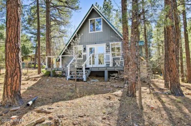 Your Lil' Cabin in the Woods!
Nestled on a heavily treed 1/4 on Bison Golf and Country Club in Arizona - for sale on GolfHomes.com, golf home, golf lot