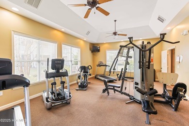 Top-floor, end-unit condo in the desirable Woodlands at Crow on Crow Creek Golf Club in North Carolina - for sale on GolfHomes.com, golf home, golf lot