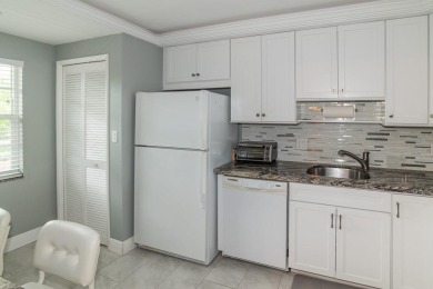 Remodeled 2 bedroom 2 bath. Beautiful kitchen includes washer on  in Florida - for sale on GolfHomes.com, golf home, golf lot