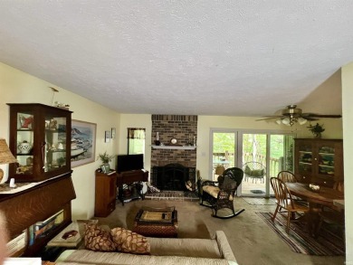 Unique End-Unit Floor Plan with Scenic Wooded Views of Lake on The Eagle Pointe Golf Resort in Indiana - for sale on GolfHomes.com, golf home, golf lot