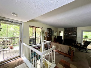 Unique End-Unit Floor Plan with Scenic Wooded Views of Lake on The Eagle Pointe Golf Resort in Indiana - for sale on GolfHomes.com, golf home, golf lot