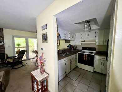 Unique End-Unit Floor Plan with Scenic Wooded Views of Lake on The Eagle Pointe Golf Resort in Indiana - for sale on GolfHomes.com, golf home, golf lot