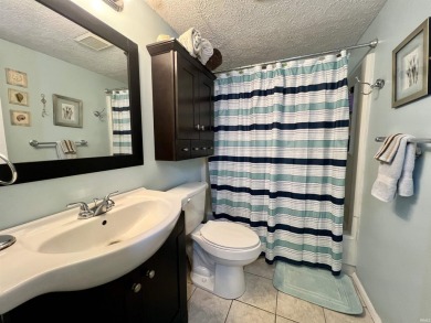 Unique End-Unit Floor Plan with Scenic Wooded Views of Lake on The Eagle Pointe Golf Resort in Indiana - for sale on GolfHomes.com, golf home, golf lot