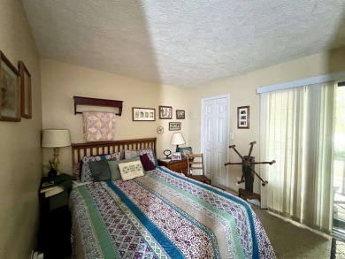 Unique End-Unit Floor Plan with Scenic Wooded Views of Lake on The Eagle Pointe Golf Resort in Indiana - for sale on GolfHomes.com, golf home, golf lot
