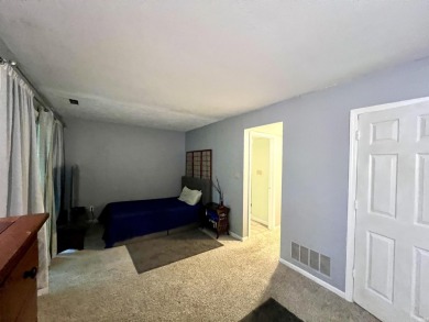 Unique End-Unit Floor Plan with Scenic Wooded Views of Lake on The Eagle Pointe Golf Resort in Indiana - for sale on GolfHomes.com, golf home, golf lot