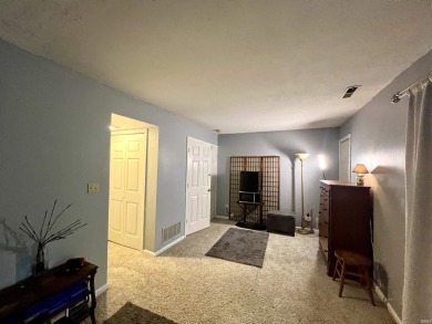 Unique End-Unit Floor Plan with Scenic Wooded Views of Lake on The Eagle Pointe Golf Resort in Indiana - for sale on GolfHomes.com, golf home, golf lot