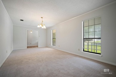 Welcome home to this lovely 3 bedroom 2 bathroom brick ranch on on Lake Forest Yacht and Country Club in Alabama - for sale on GolfHomes.com, golf home, golf lot