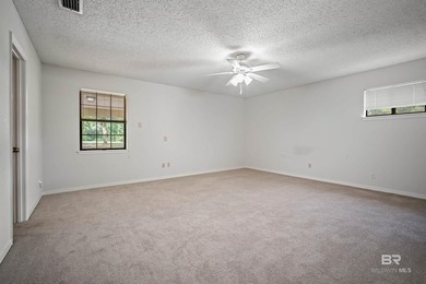 Welcome home to this lovely 3 bedroom 2 bathroom brick ranch on on Lake Forest Yacht and Country Club in Alabama - for sale on GolfHomes.com, golf home, golf lot