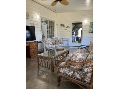 Enjoy resort-style living in this beautifully maintained on The Riverside Golf Club in Florida - for sale on GolfHomes.com, golf home, golf lot