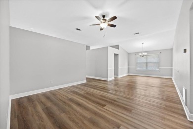 This must-see all brick home is nestled in the sought-after on Fairway Oaks at Magnolia Golf Course in Florida - for sale on GolfHomes.com, golf home, golf lot