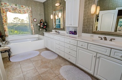 Discover The Perfect Blend Of Luxury  Comfort In This Stunning on Marsh Creek Country Club in Florida - for sale on GolfHomes.com, golf home, golf lot