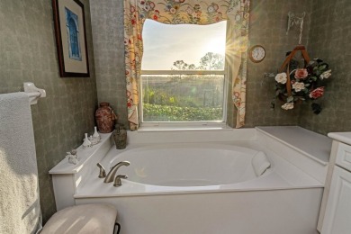 Discover The Perfect Blend Of Luxury  Comfort In This Stunning on Marsh Creek Country Club in Florida - for sale on GolfHomes.com, golf home, golf lot