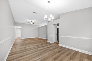 This must-see all brick home is nestled in the sought-after on Fairway Oaks at Magnolia Golf Course in Florida - for sale on GolfHomes.com, golf home, golf lot