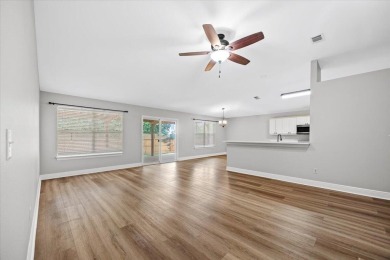This must-see all brick home is nestled in the sought-after on Fairway Oaks at Magnolia Golf Course in Florida - for sale on GolfHomes.com, golf home, golf lot