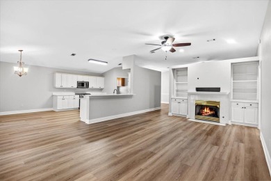 This must-see all brick home is nestled in the sought-after on Fairway Oaks at Magnolia Golf Course in Florida - for sale on GolfHomes.com, golf home, golf lot