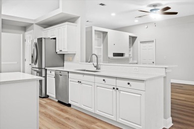 This must-see all brick home is nestled in the sought-after on Fairway Oaks at Magnolia Golf Course in Florida - for sale on GolfHomes.com, golf home, golf lot