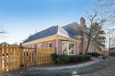 Tucked away on a quiet circle in Atlanta Country Clubs back nine on Atlanta Country Club in Georgia - for sale on GolfHomes.com, golf home, golf lot